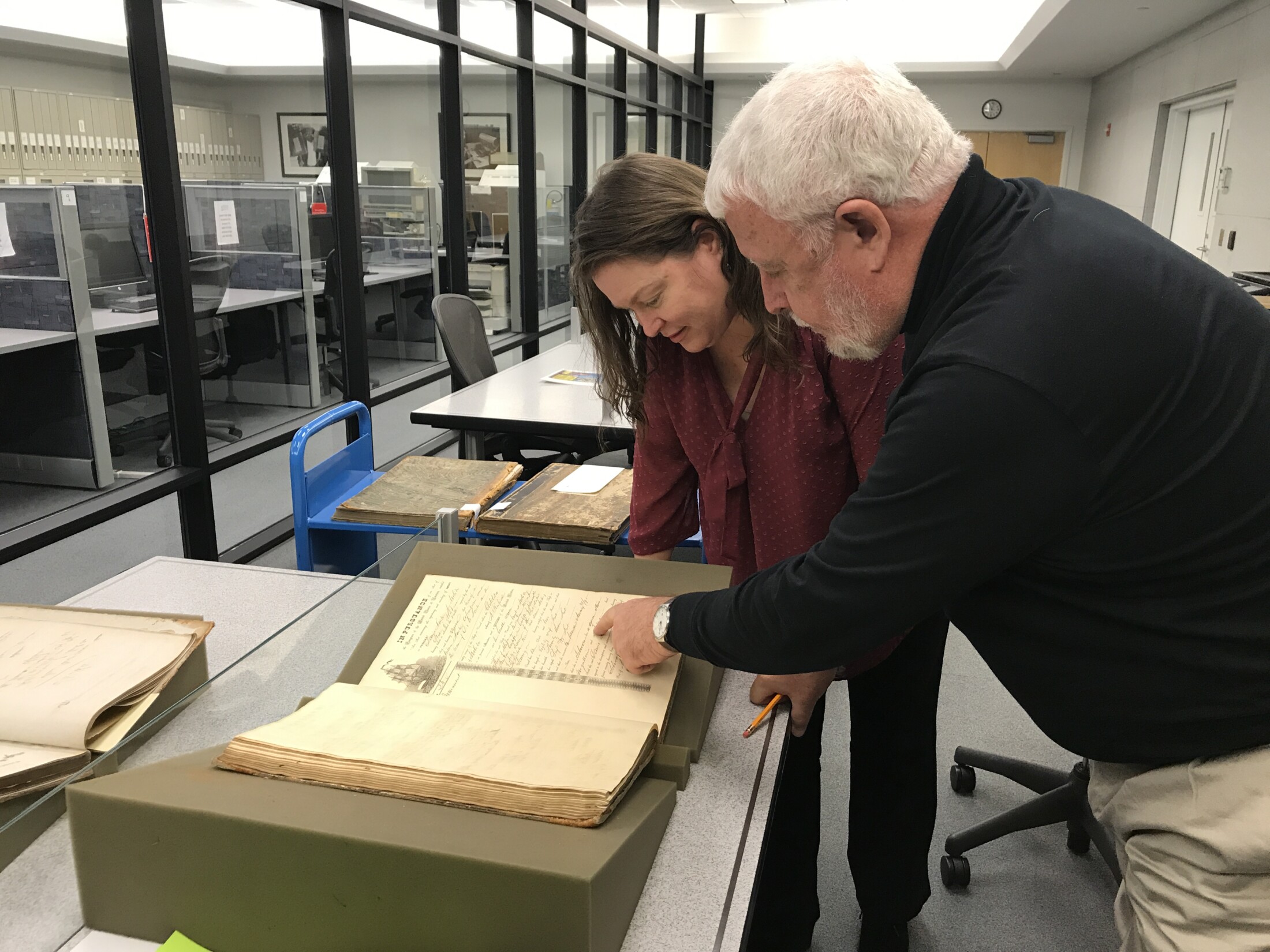Alabama State Archaeologist Stacye Hathorn and Jim Examine Clotilda's Original Registry Documents at The National Archives